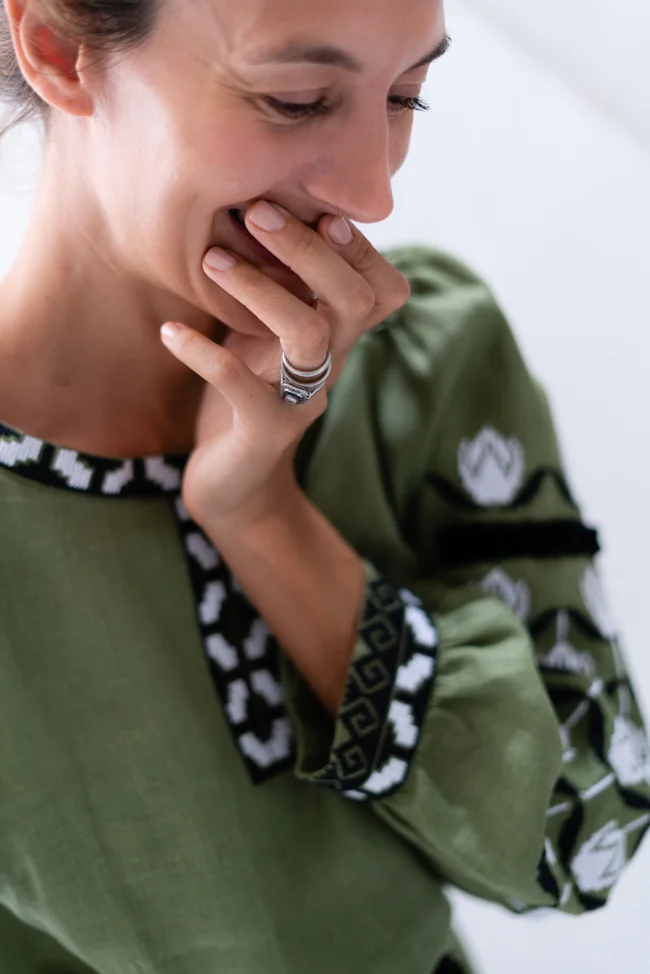 Delphine is wearing a dress by Bravo Collection