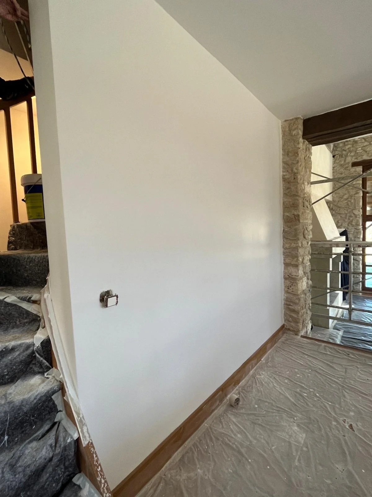 Painting kitchen wall.JPG