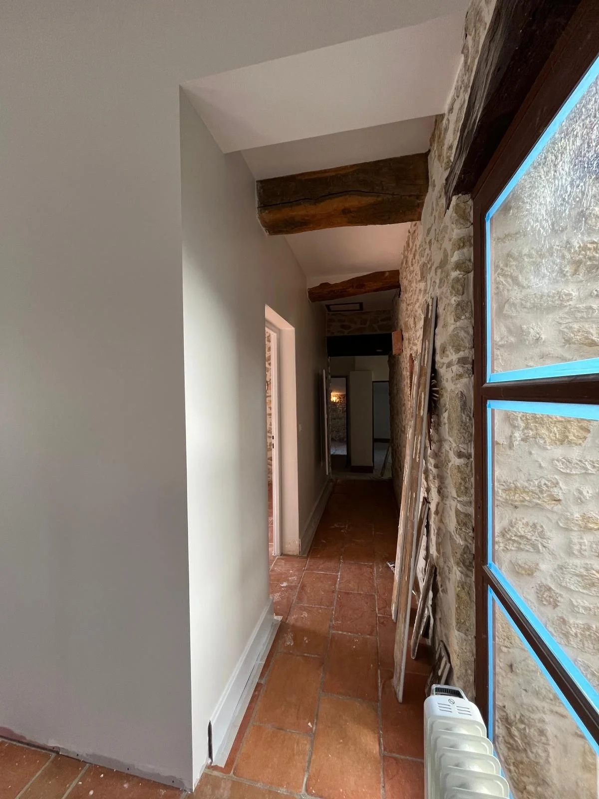 Hallway showing plastering and painting.JPG