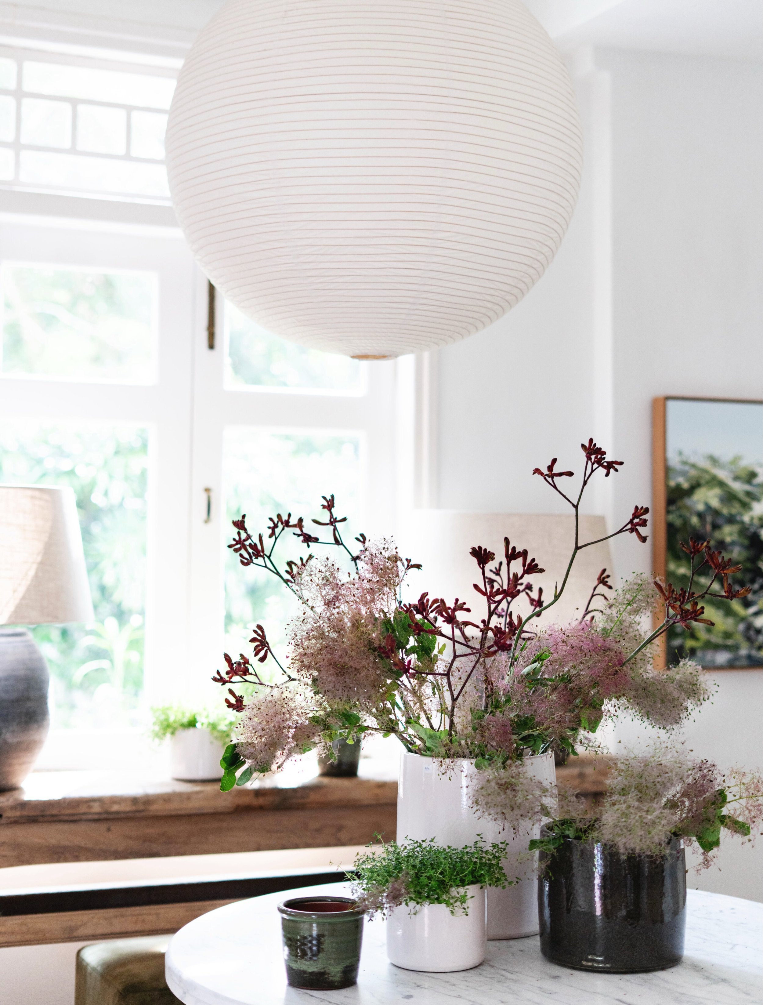 Now that I have this cluster of Vincent van Dyson pots on the marble table, I&rsquo;m not sure I can go back to the previous styling. 

(Chalk  this up to one of the pitfalls of using your own home to style items for the shop). On some level I want t