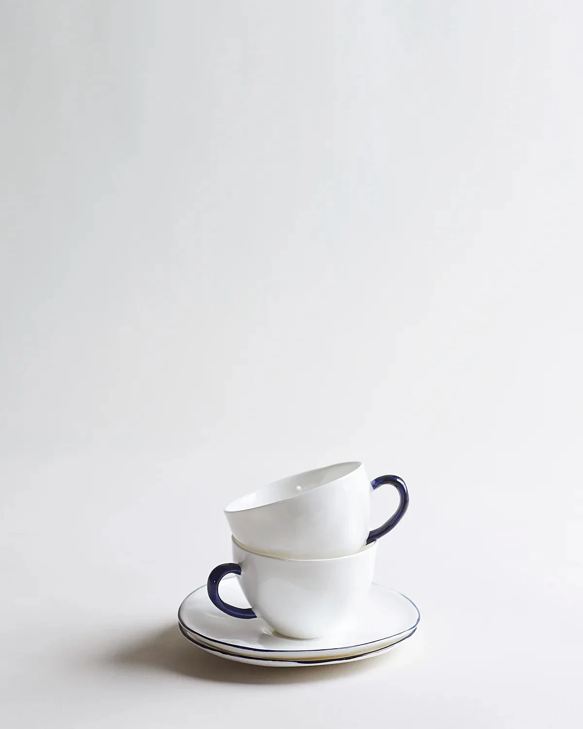 Tea cup and saucer stacked.jpg