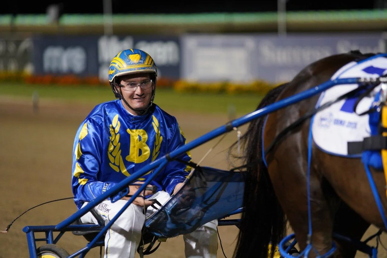 Image courtesy National Trotguide - Sam with Anthony Robinson - one of the most improved drivers in the business.