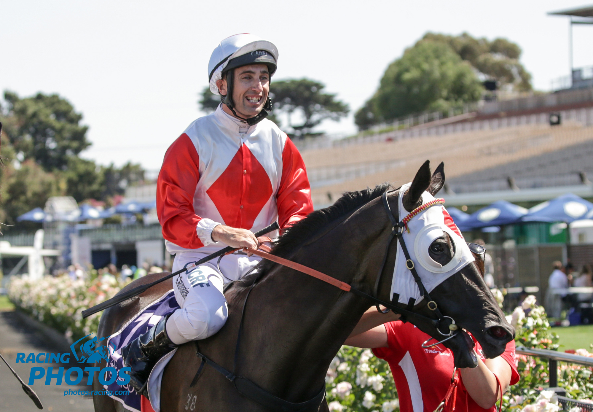 Image courtesy Racing Photos - Anthony returns to scale after his first Group 1 win.