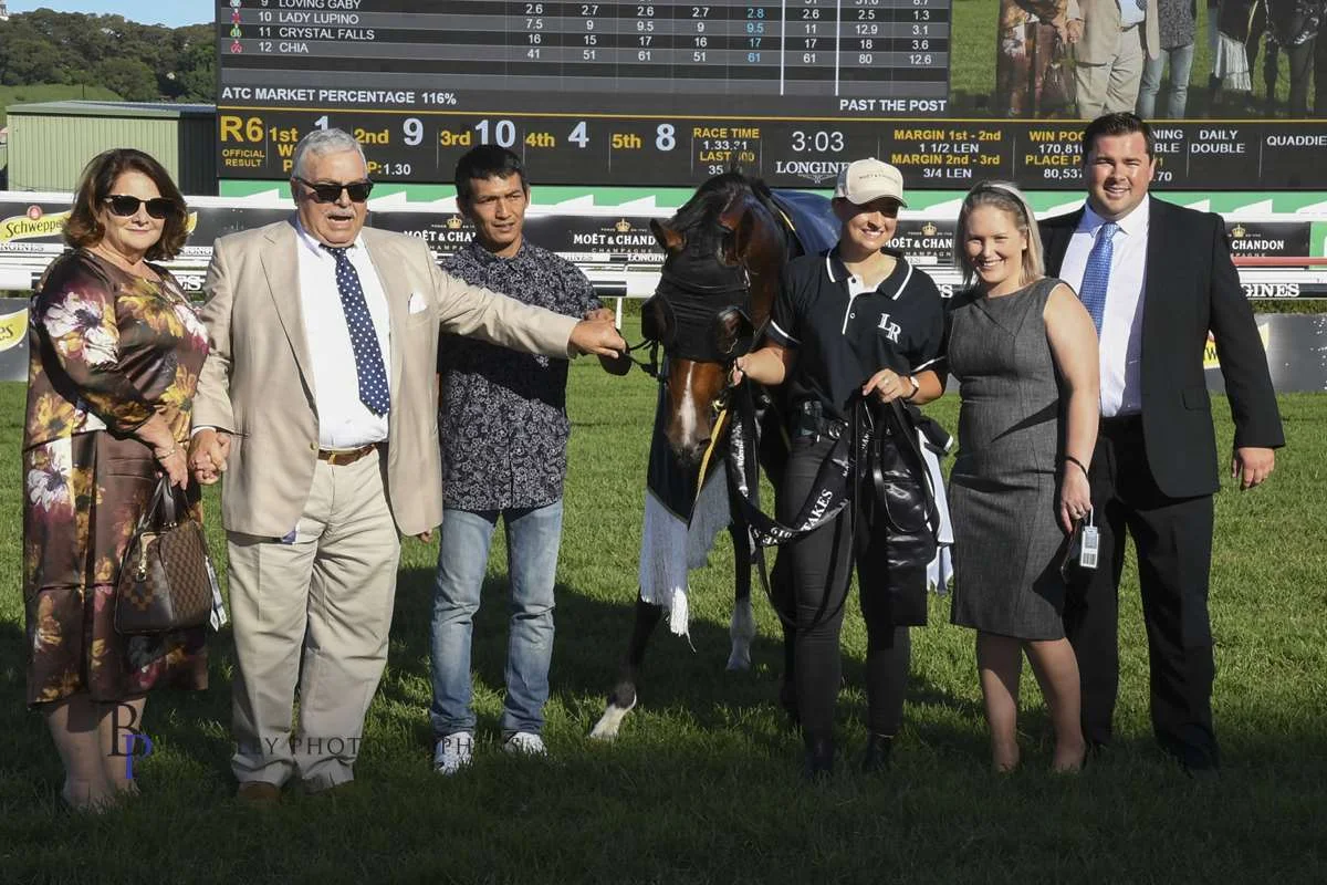 Image courtesy Bradley Photographers - a happy group after the Champagne Stakes - Owen Galletta, second from left and trainer Richard Litt extreme right.