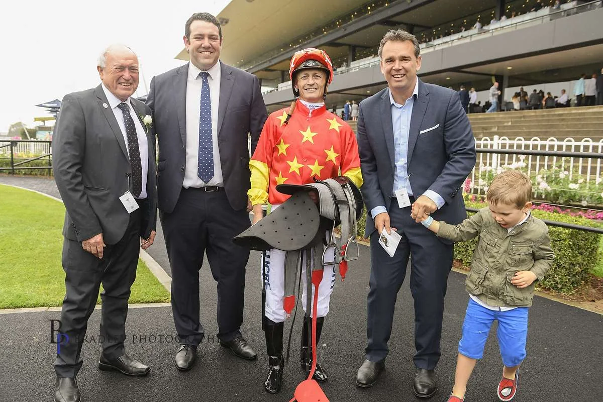 Image courtesy Bradley Photographers - A group of satisfied customers with Damian Browne at Rosehill.