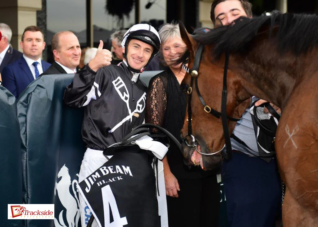 Image courtesy Trackside Photography - Thumbs up from Ben after The Hinkler. Trainer Jenny Graham shared his delight.