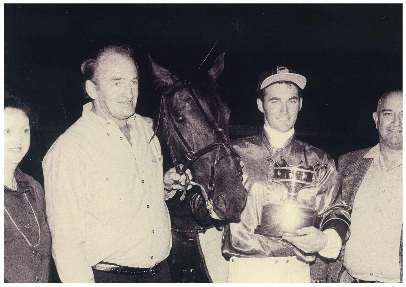 Image courtesy National Trotguide - David and Jason Proctor with the handsome trophy after Bastille Beggar's Gold Crown win.