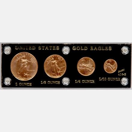 FOUR 1986 GOLD AMERICAN EAGLE COIN SETA Group of Four 1986 Gold American Eagle Coins, Circulated.Est. $3,000 - $3,200