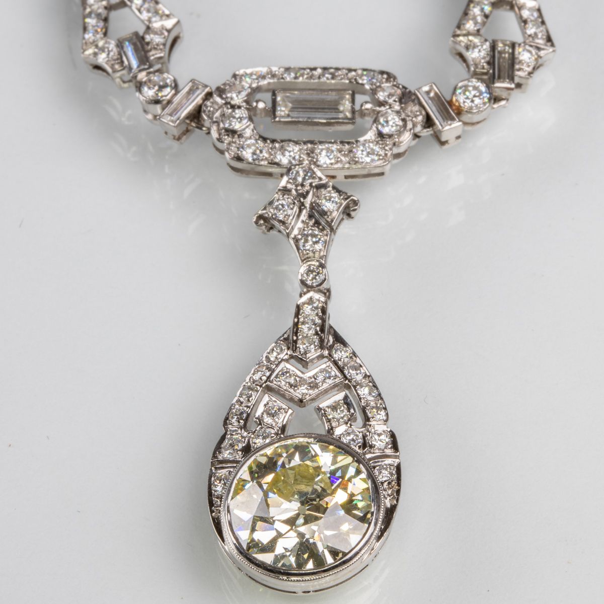 A 14kt. White Gold and Diamond Drop Pendant Necklace, sold $9,000