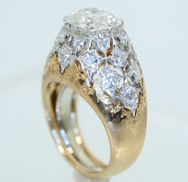 An 18kt. Rose and White Gold Diamond Ring by Mario Buccellati, sold $18,000