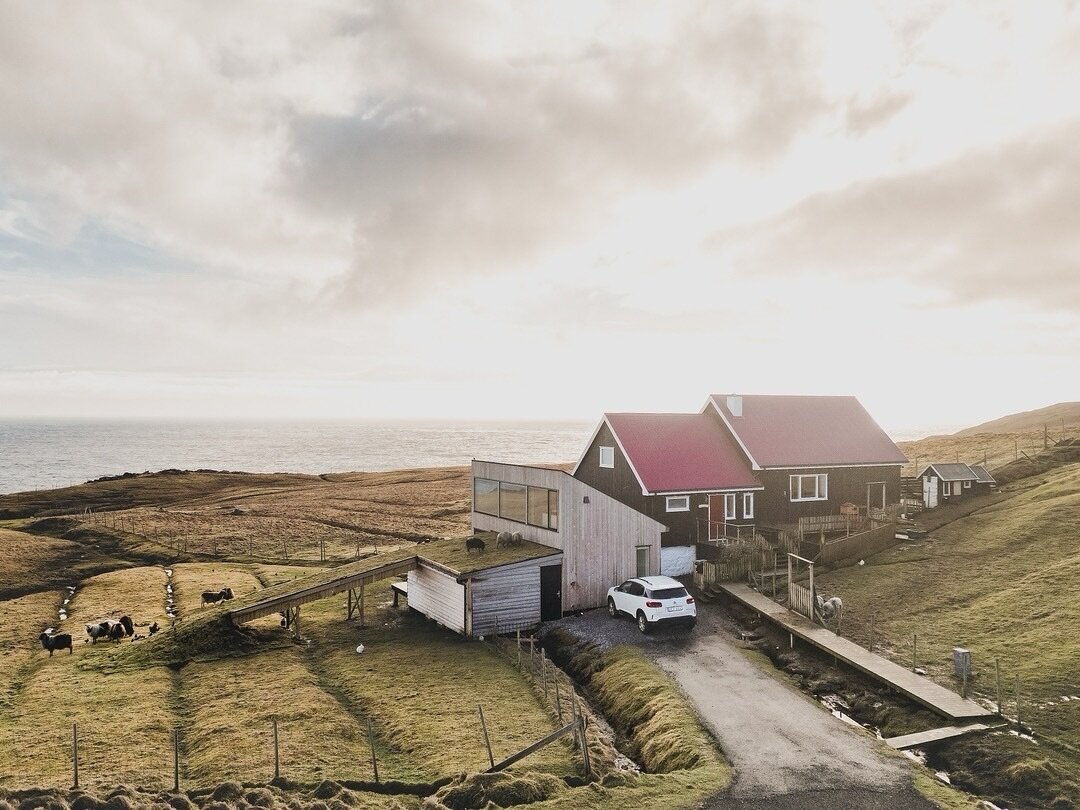 We finally had some time to update our website and take new photos - THIS is what our house looks like at the moment 🙌🏻
.
The black house with the red roof is our own residency while the new extension with turf roof leading up to it and BIG windows