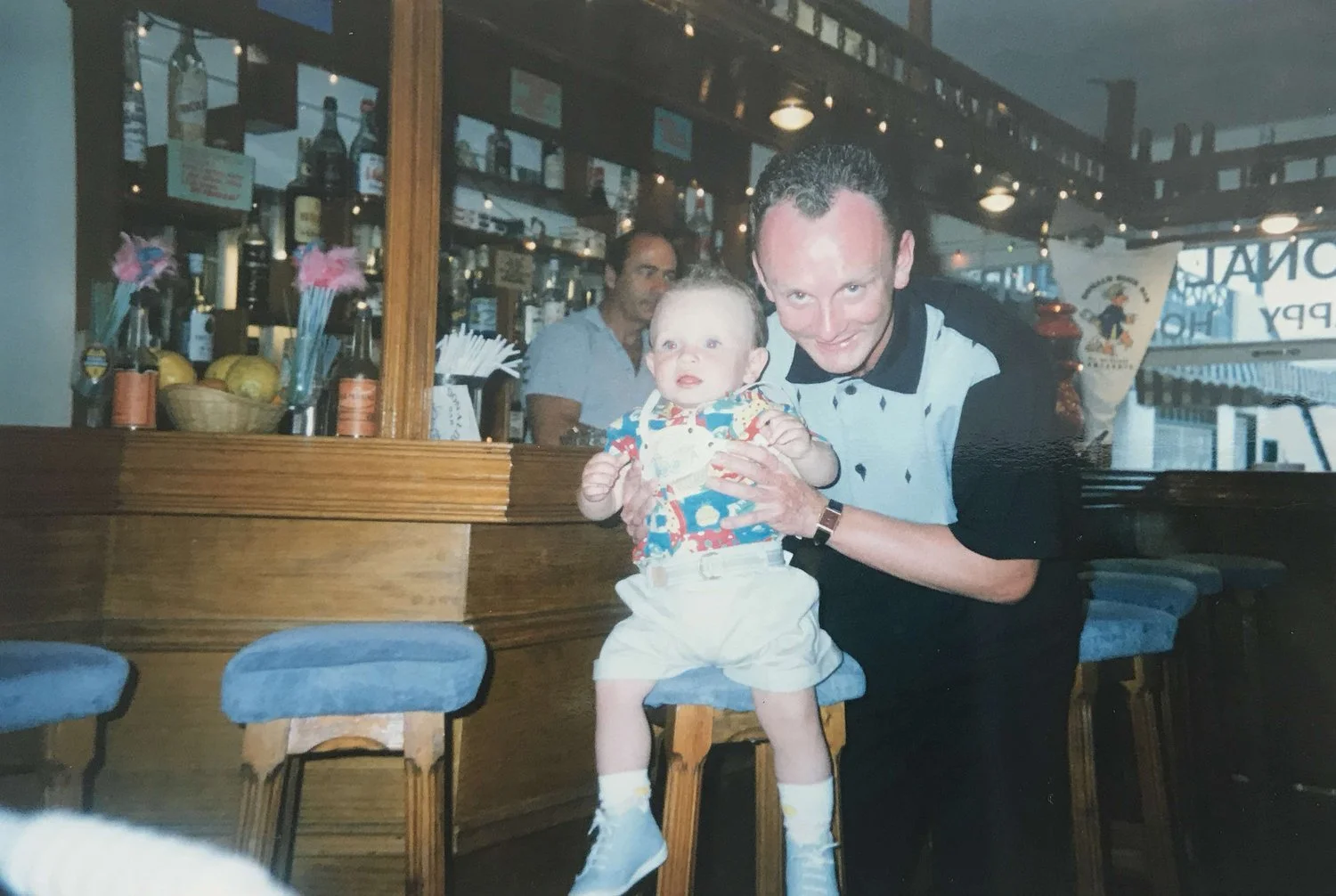 My father, Mark Archibald Reid, holding me (the toddler) a few years after the Piper Alpha Disaster.