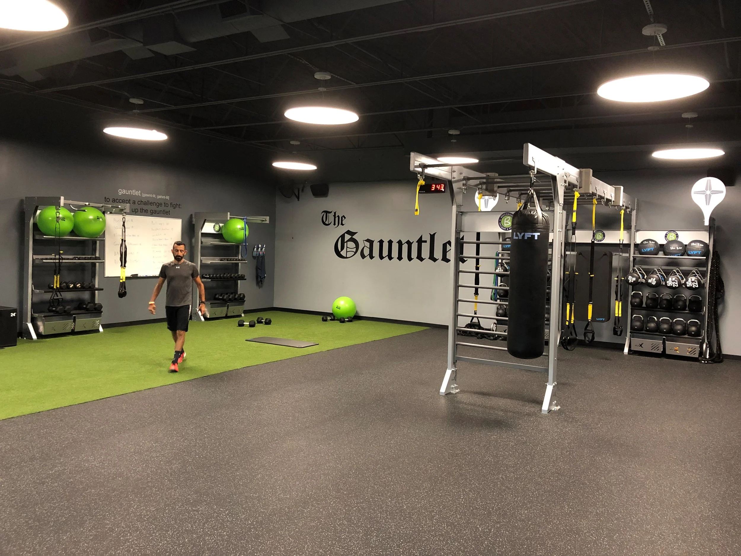 GAUNTLET (gawnt-lit, gahnt-lit) to accept a challenge: to fight: take up the gauntlet : trying conditions: an ordeal: a form of punishment, chiefly military, in which the offender was made to run between two rows of men who struck at him with switches or weapons as he passed