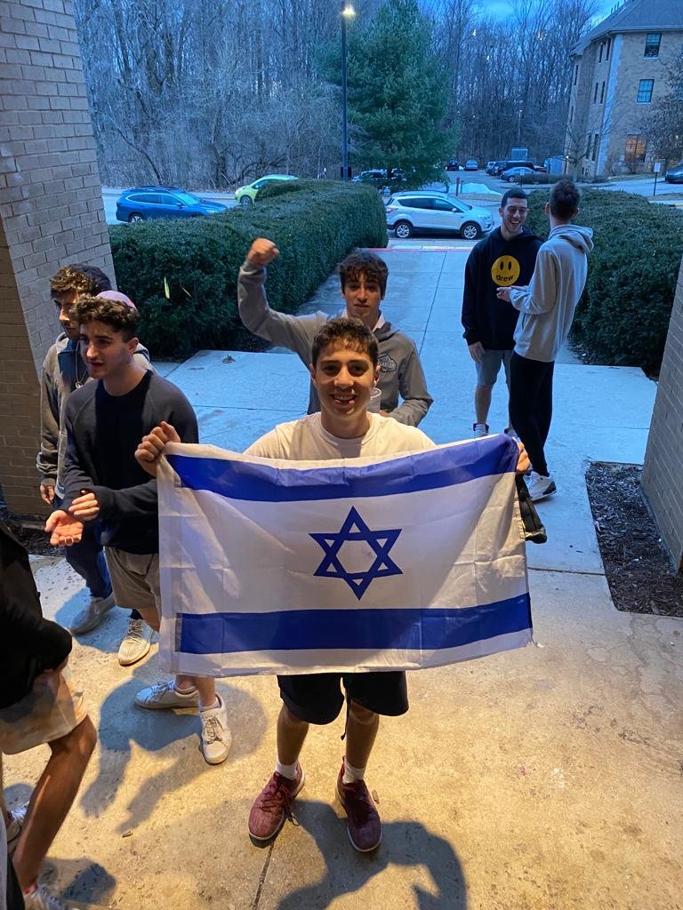 Student w Israeli Flag.jpg