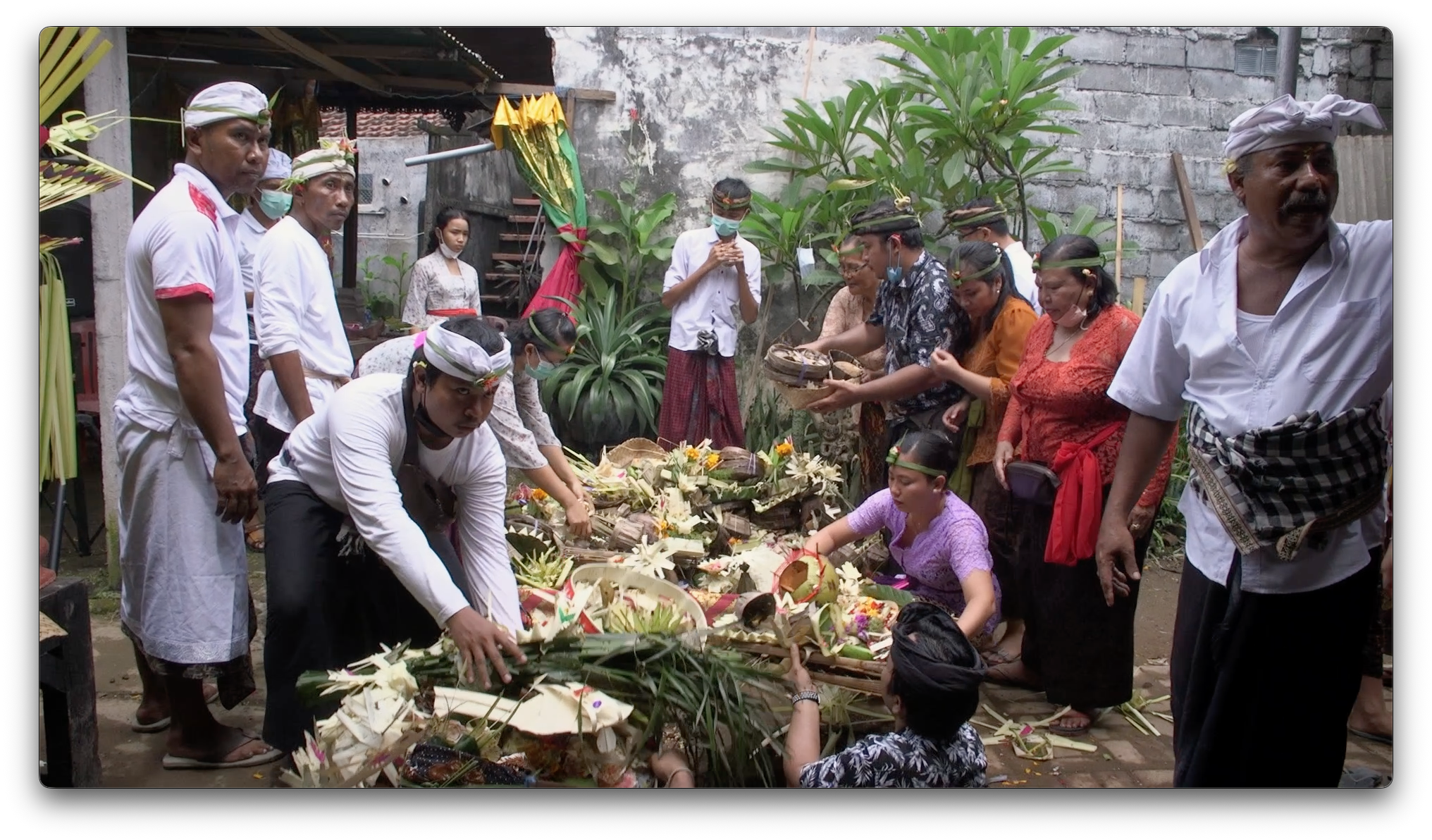 Ketut and Guru with Family at Ceremony.png