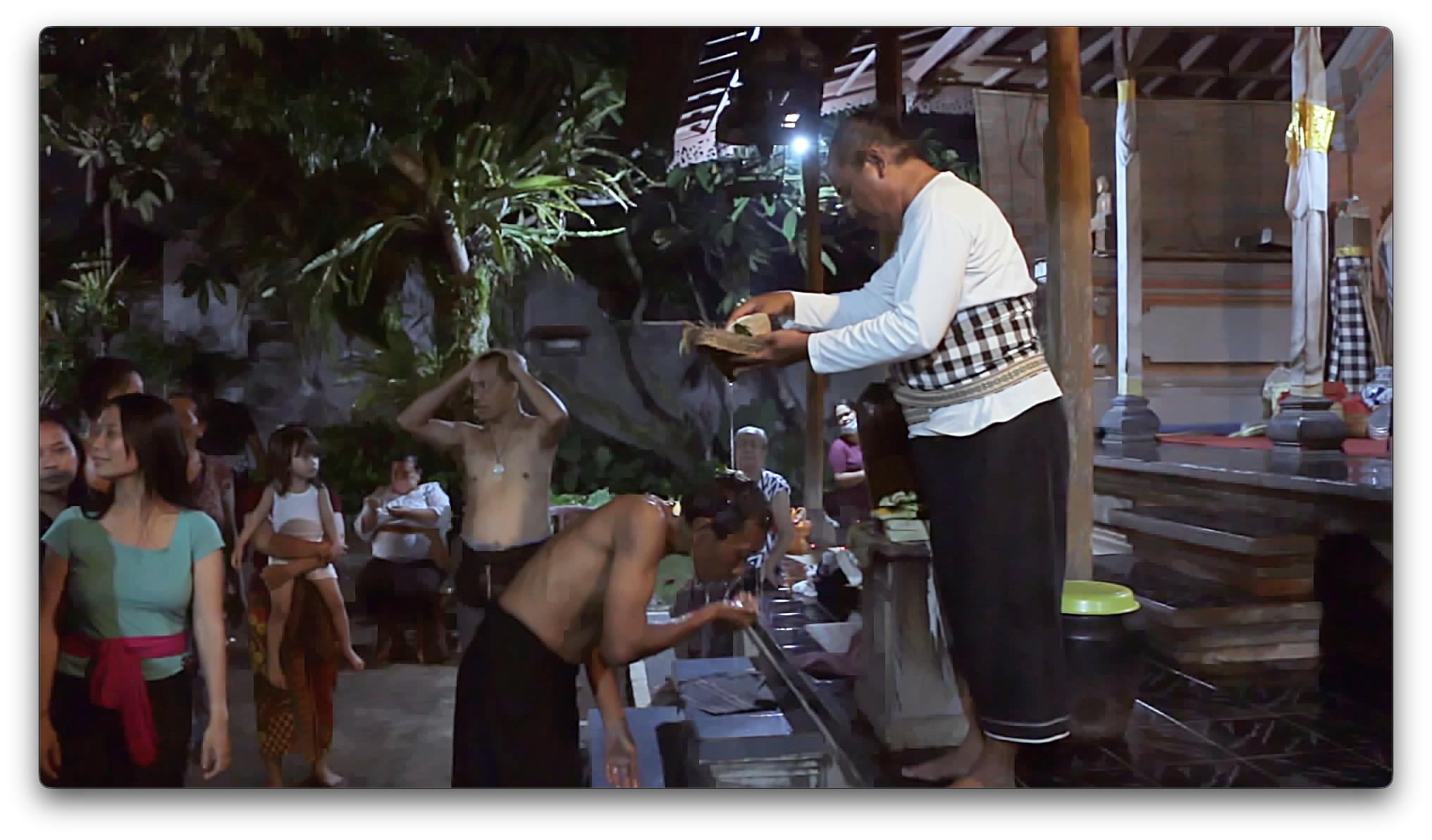 Ketut blessed by Guru.png