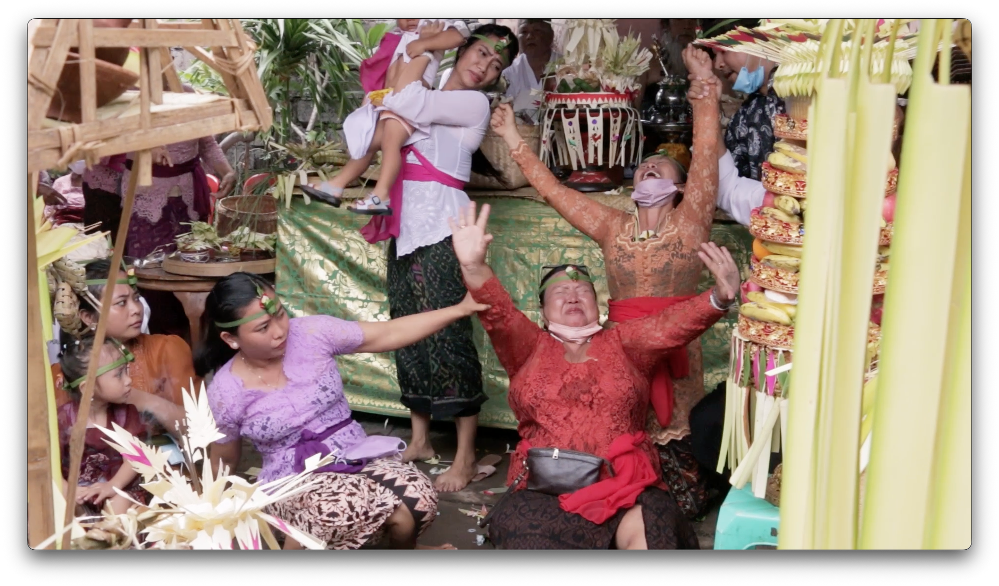 Ketut family in trance.png