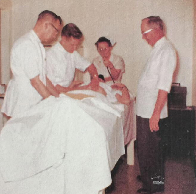 Picture of Dr. White (right) Dr. Jacob (middle) and Dr. Failor (left) performing an abdominal manual therapy at the Happy Acres Hospital in McMinnville, Oregon in the 1950s.