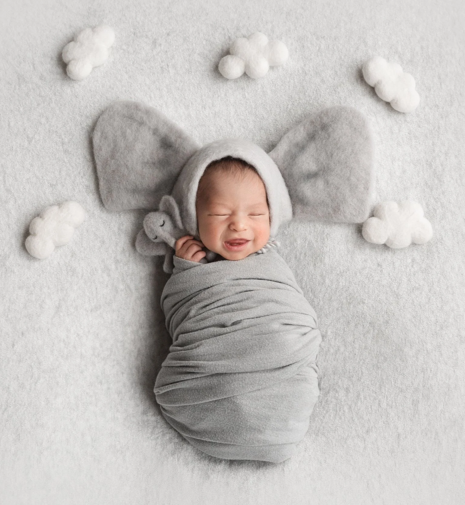 Giselle's Newborn Sneak Peek Photos