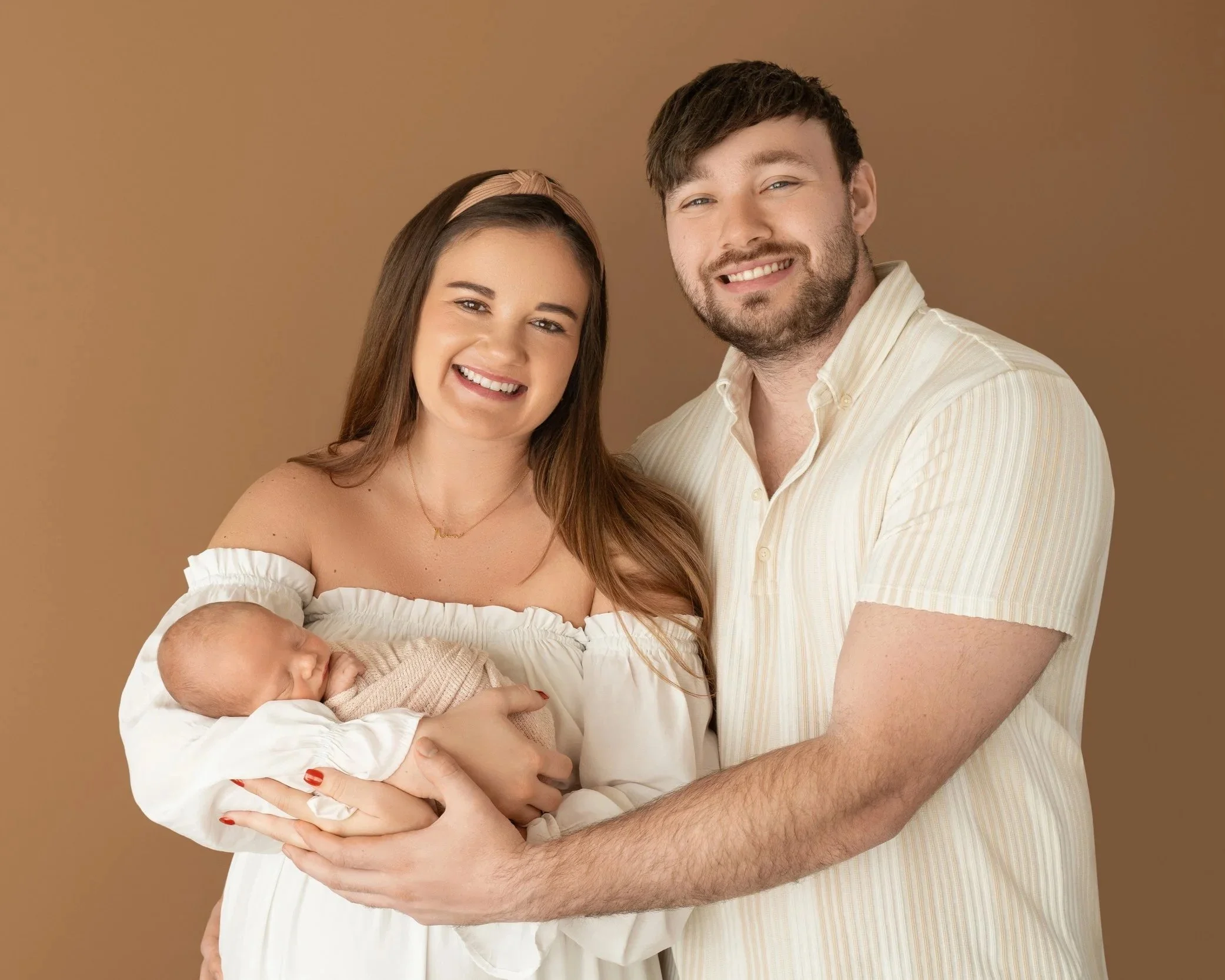 first official family newborn photo with baby mom and dad