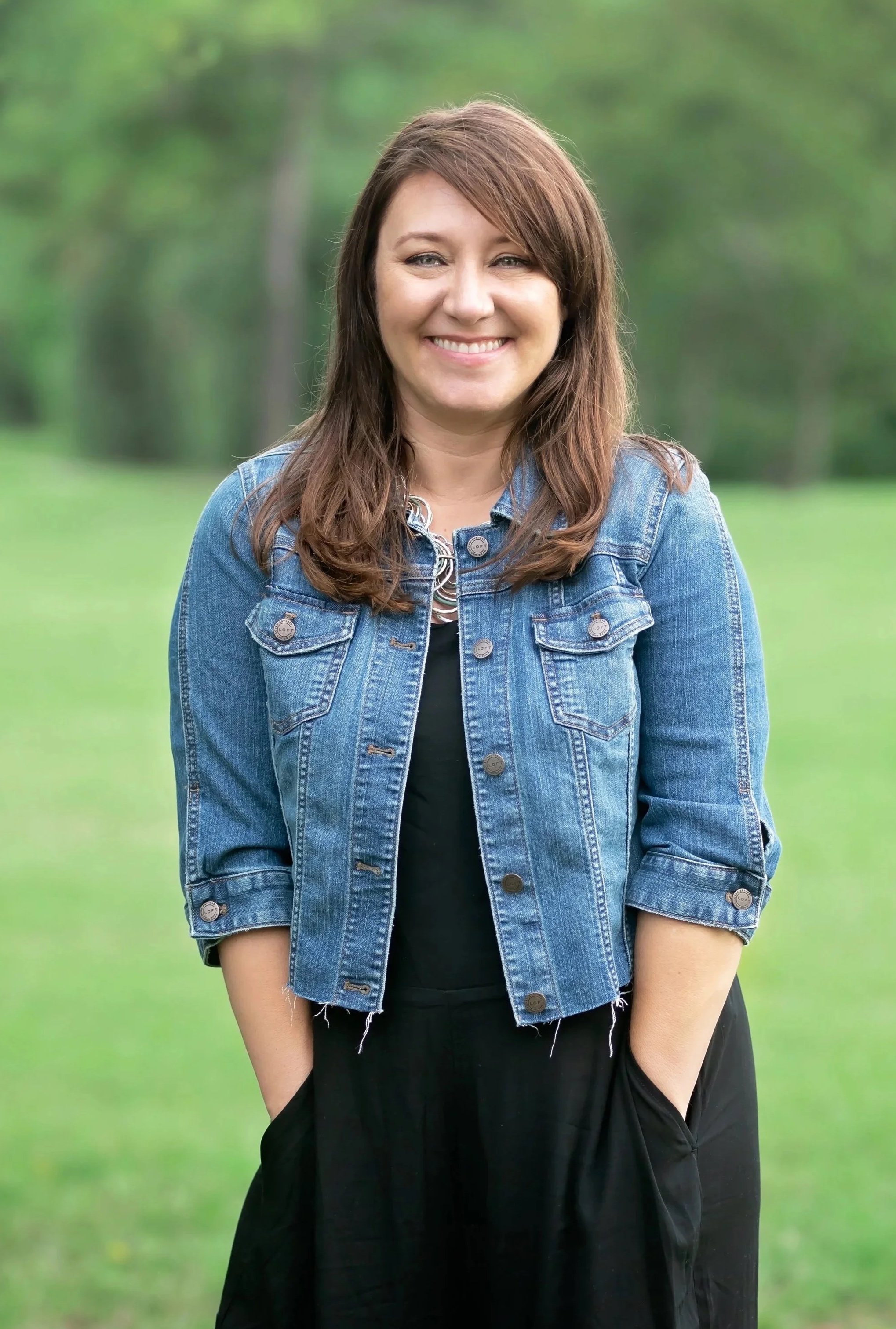 Becky Kelley, owner of Becky K Photography, specializing in newborn, senior, family, cake smash, maternity and heirloom photography.