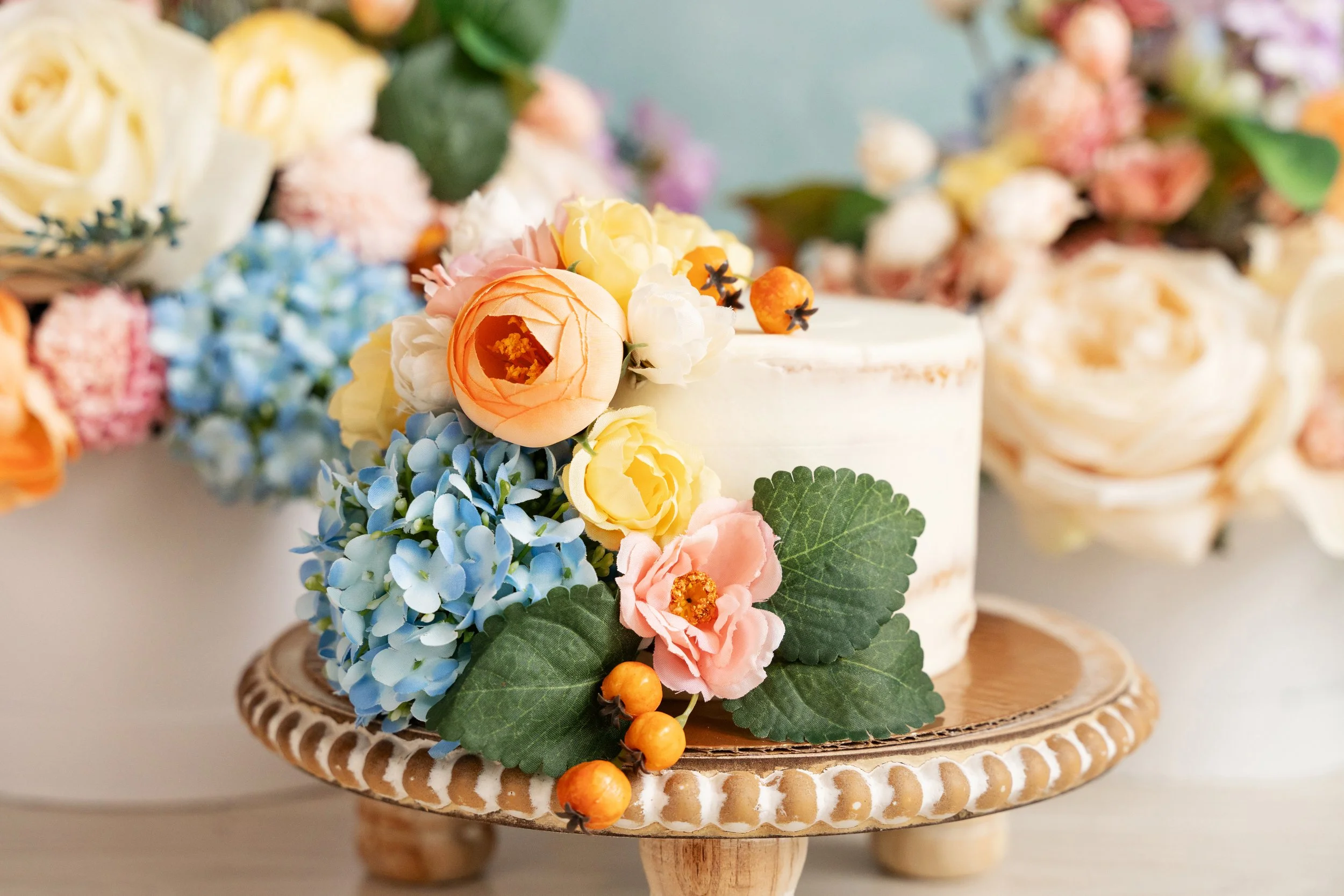 Ava’s cake smash session with handmade floral cake decorations