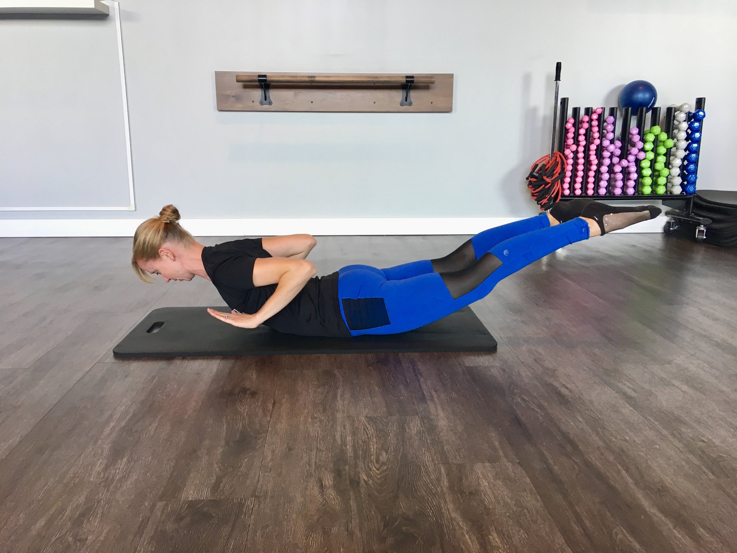 AN ARM AND A LEG BACK EXTENSIONS — Fifty 5 Fitness