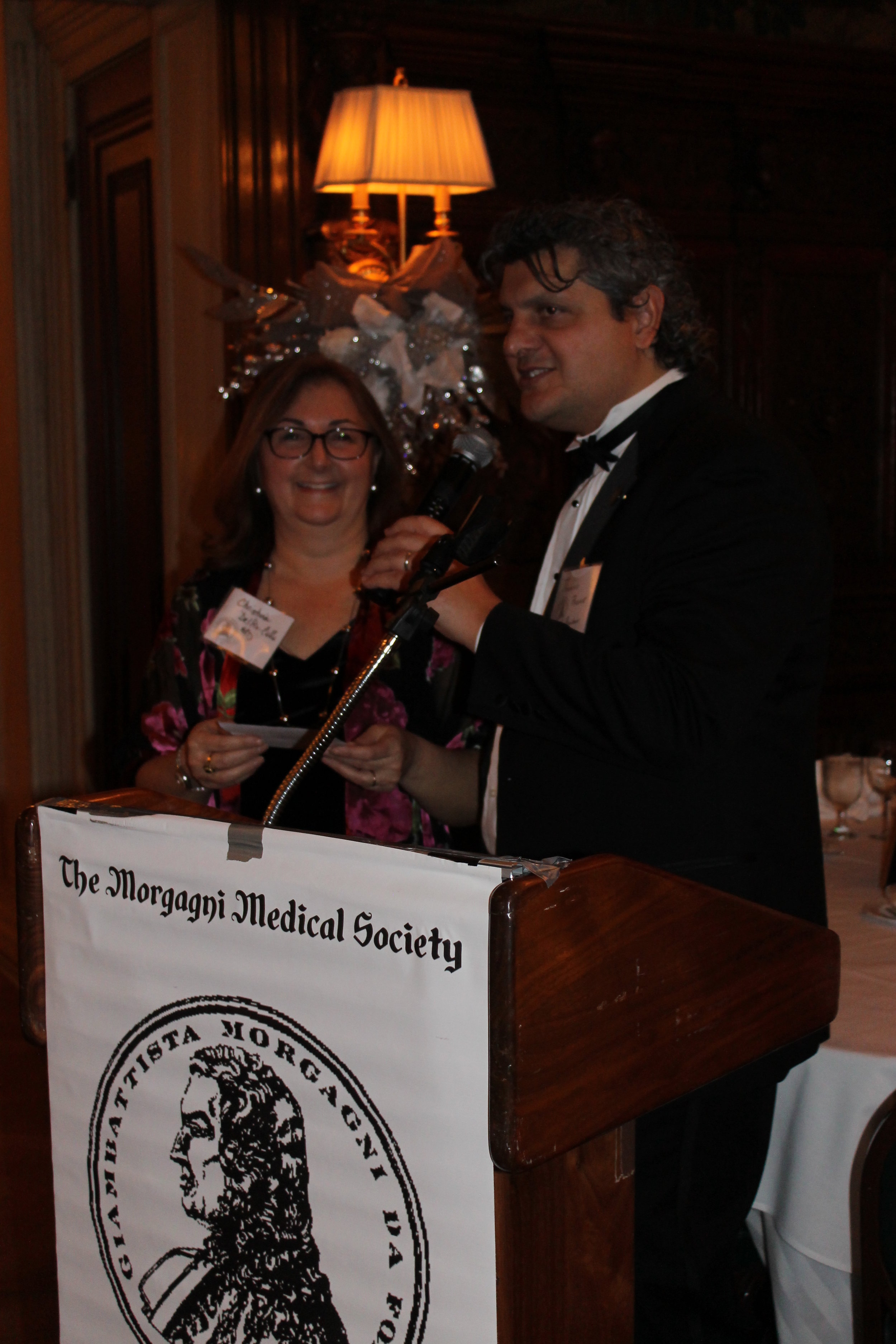 Dr. Paone introducing Dr. Christina Del Pin Director of Gala Silent Auction