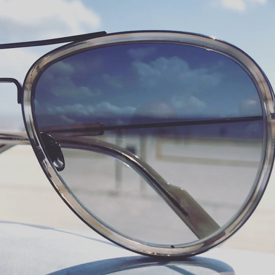 Left lens close up at the beach