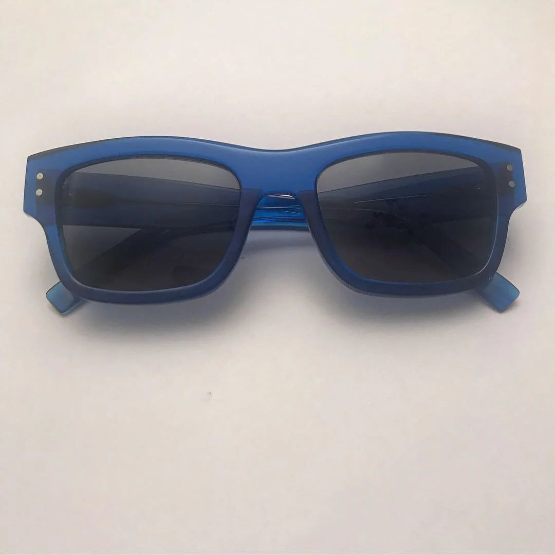Full front blue acetate frame w/ grey sun lens