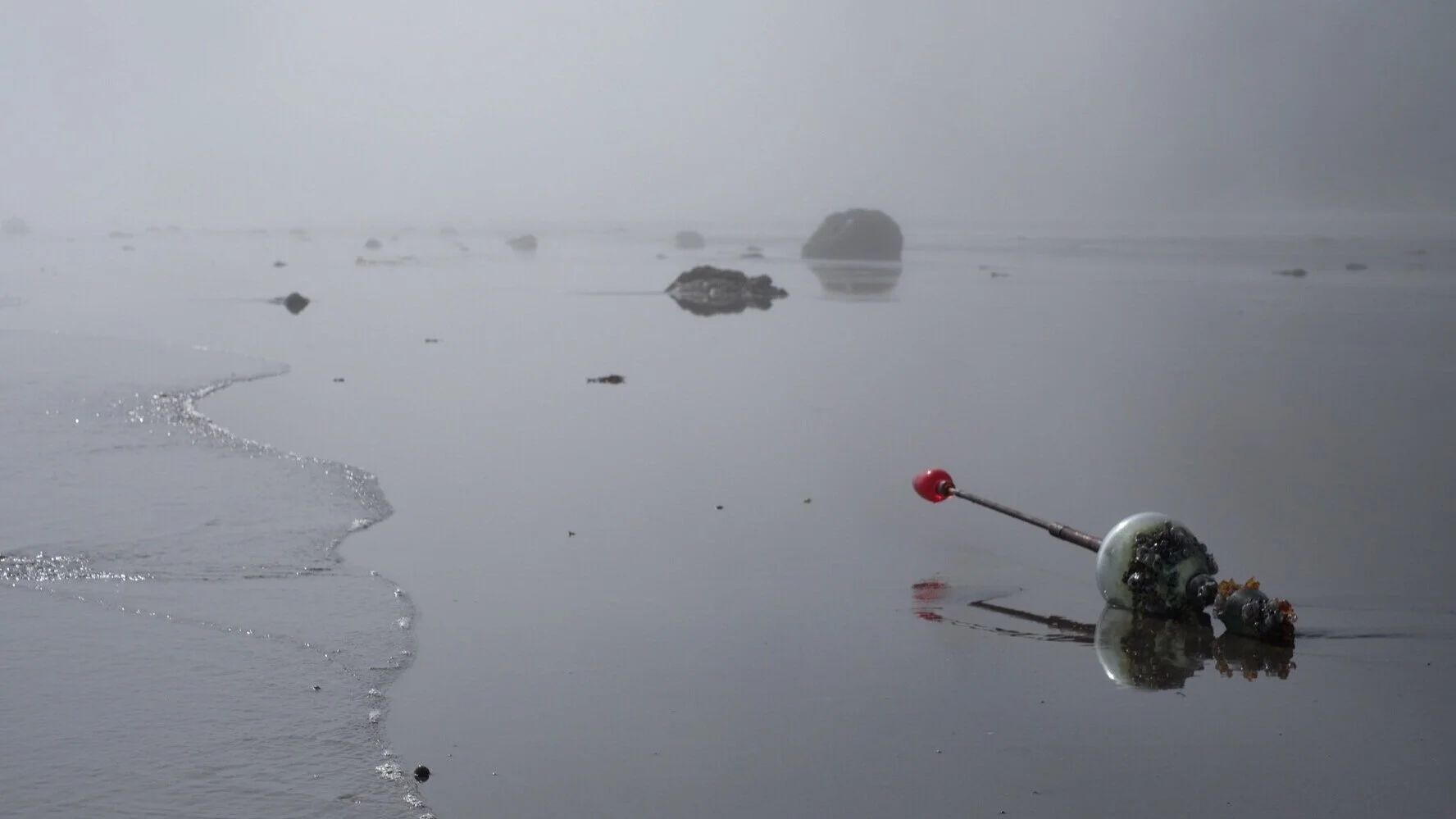 Spar buoy off the tide. 