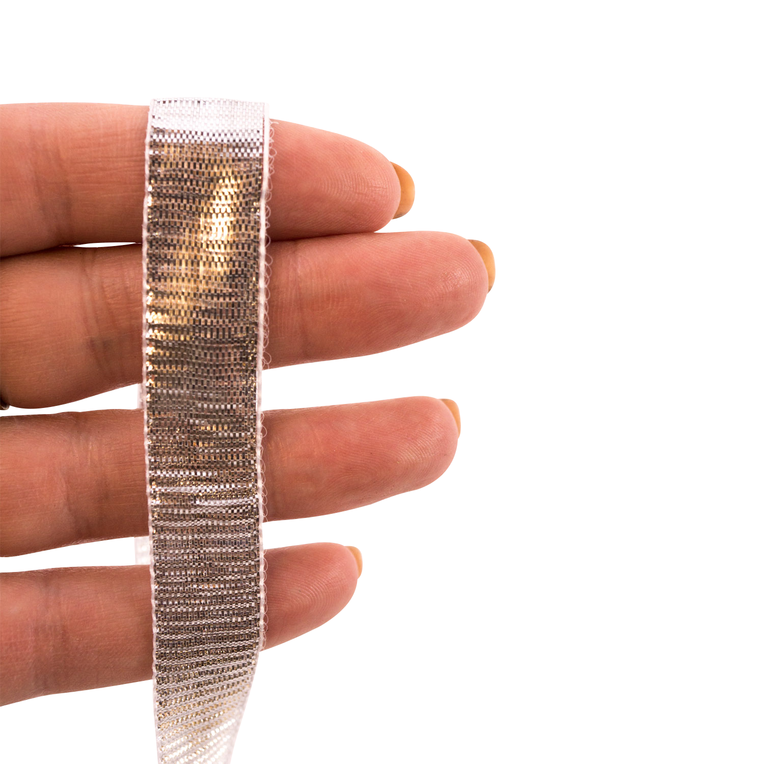 Hand holding silver decorative ribbon