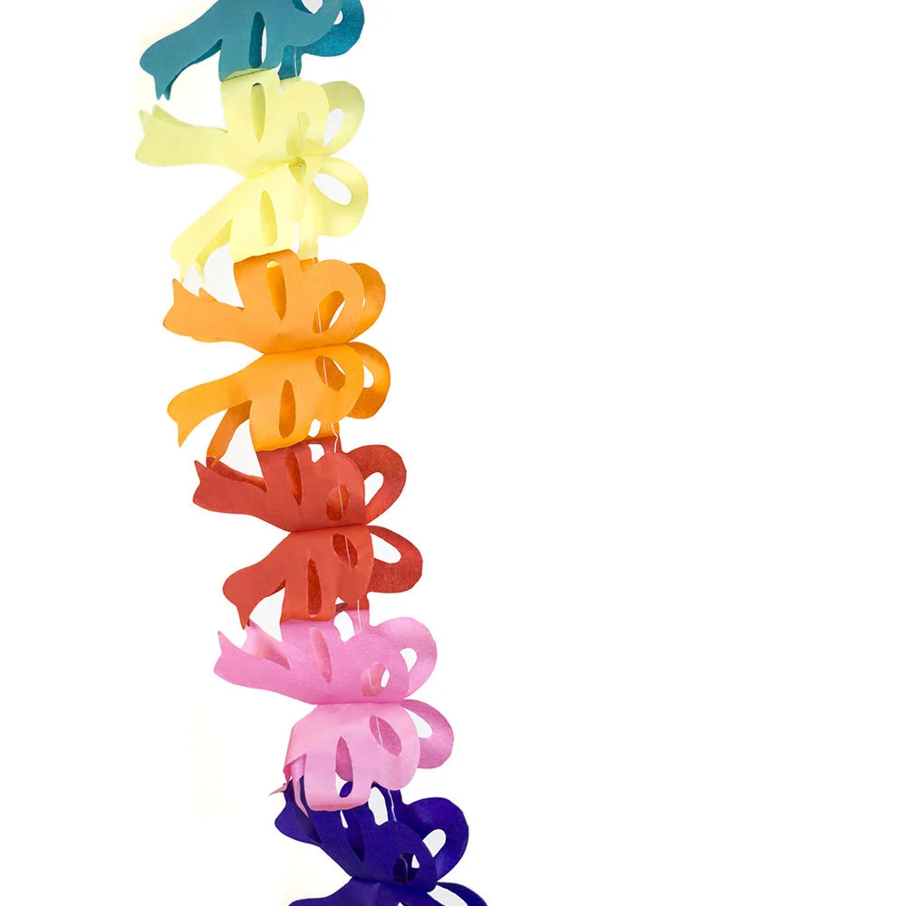 Multicolored paper bow garland, close up