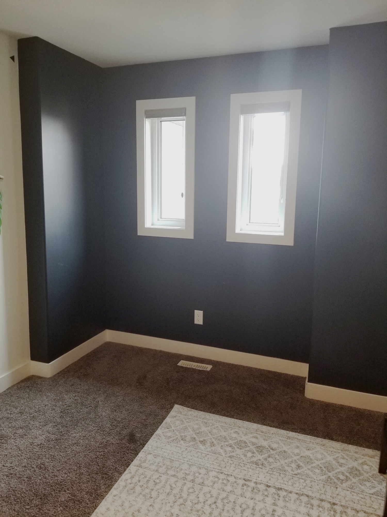 Before Picture That wall color is “Witching Hour” by Benjamin Moore