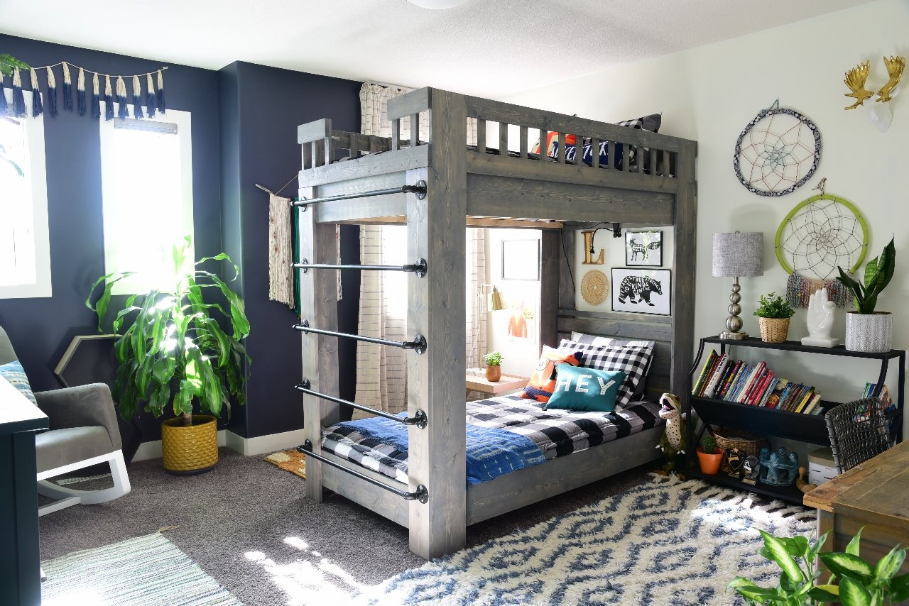 Three years ago we built them these bunk beds. You can find the tutorial here . We tweaked the design a bit.