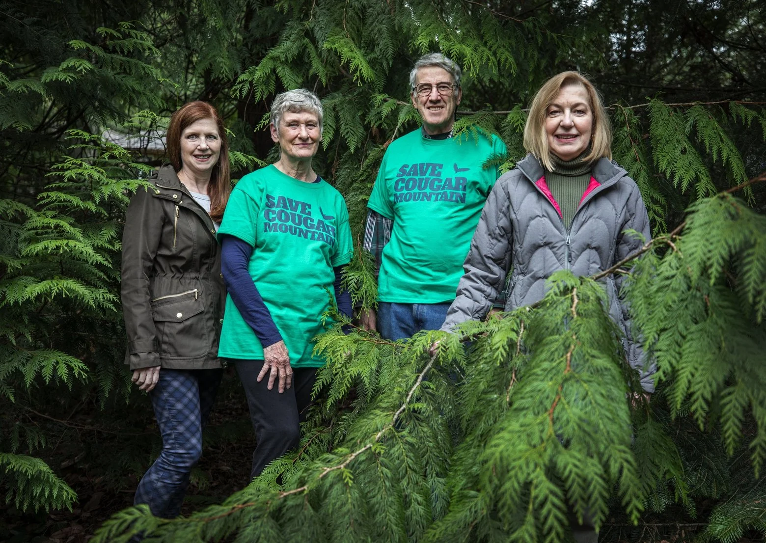 Save Cougar Mountain Activists (L to R): Julie Clark, Kay Haynes, David Kappler and Susan Neville. Photo: Steve Ringman/The Seattle Times