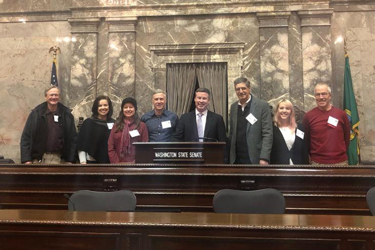 The District 5 sub-group (covering east King County towns like Issaquah, Maple Valley, Snoqualmie, North Bend, etc.), meeting with state Senator Mark Mullet. The senate was not in session, so we were lucky to take this photo in the senate chambers.