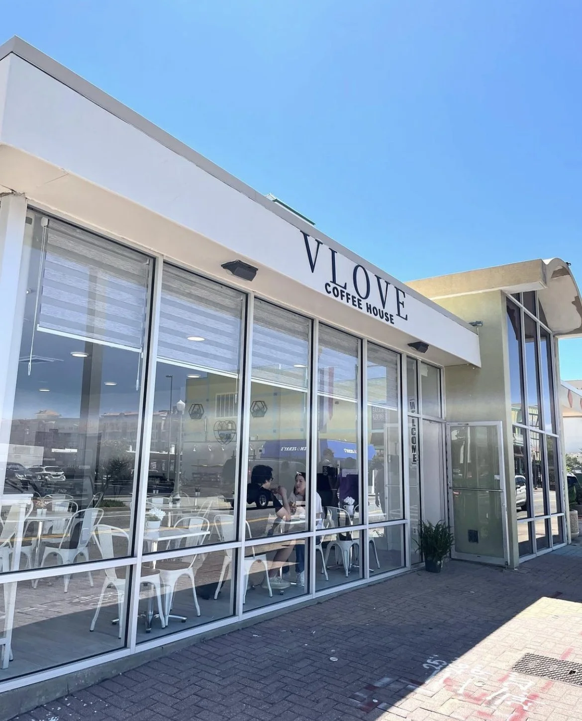 VLOVE Coffee House exterior with lots of windows