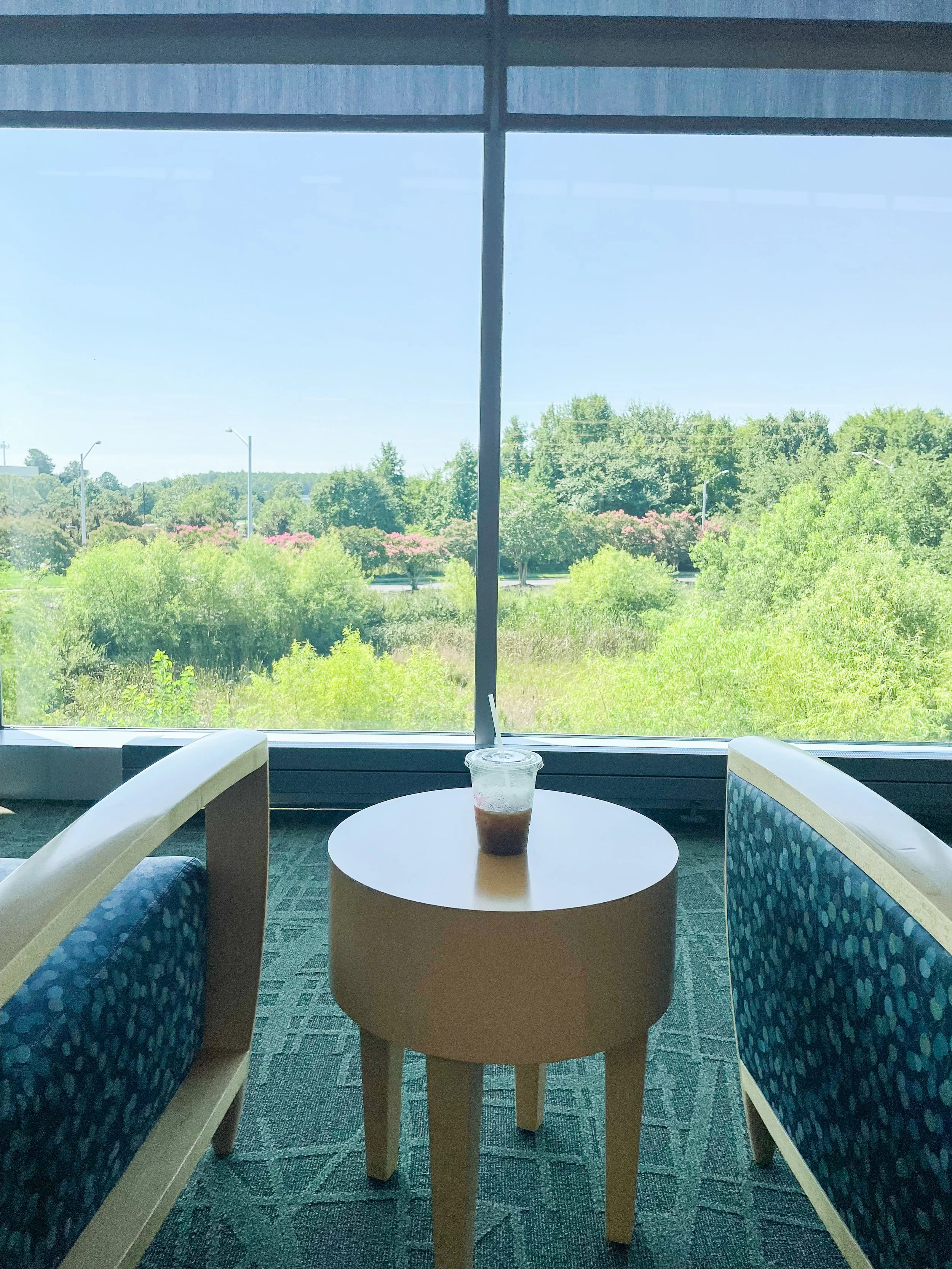 Inside of TCC / City of Virginia Beach Joint-Use Library with coffee cup