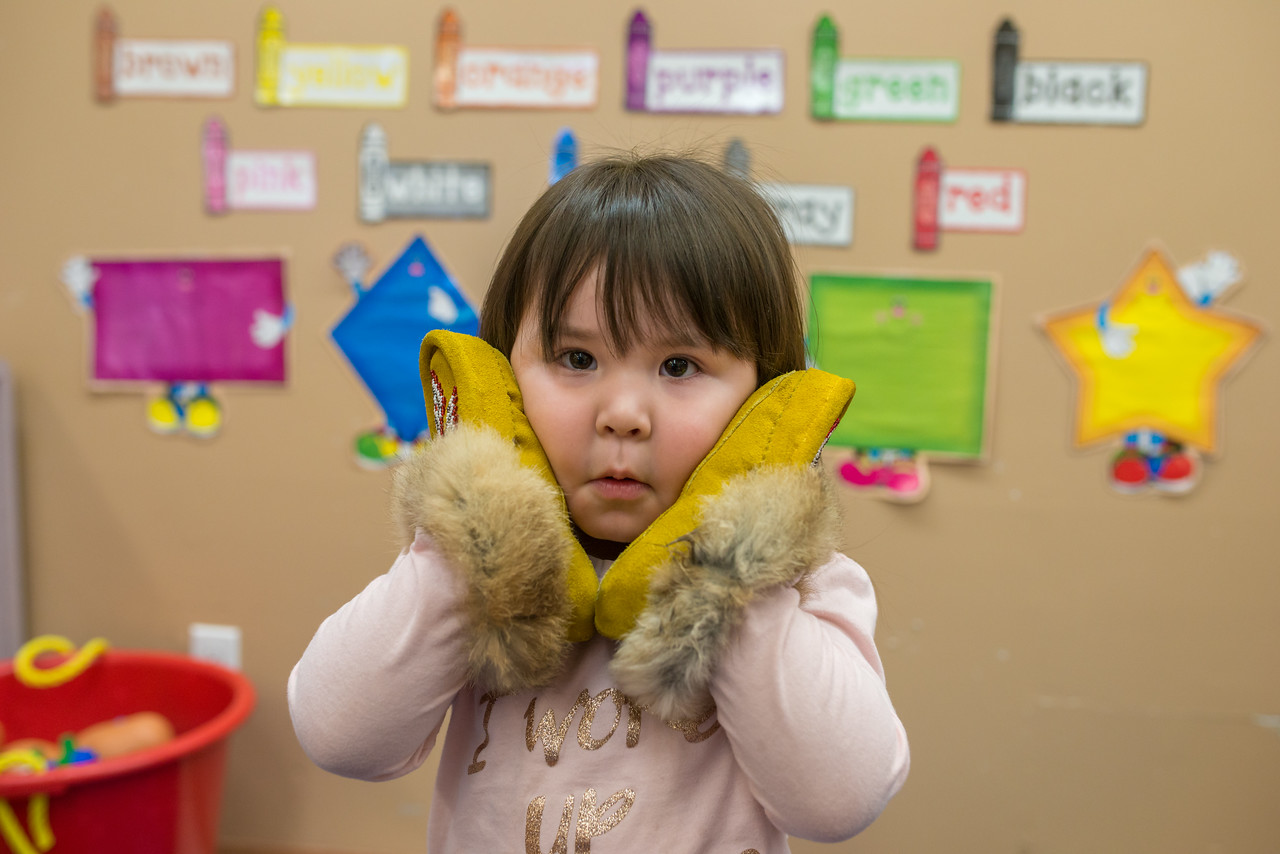 child holding mocassins.jpg