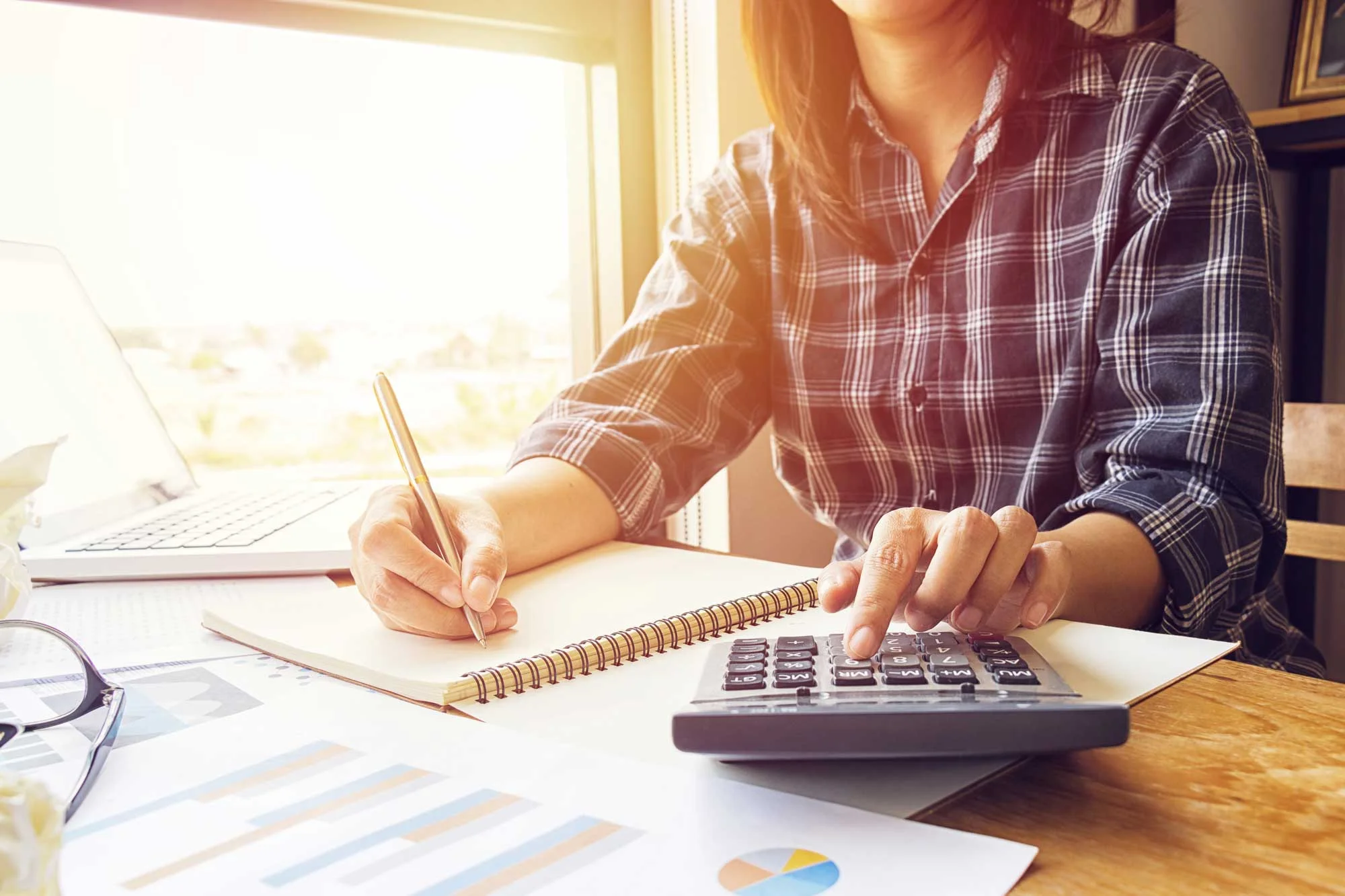 bigstock-Asian-Business-Woman-Using-Cal-234139735web.jpg