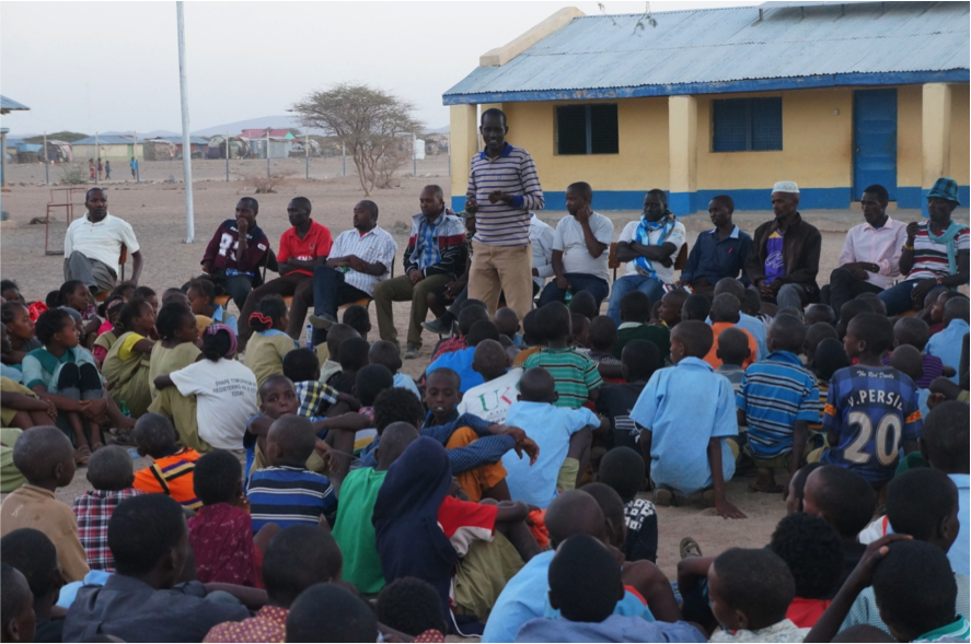 NRT education officer Julius Lolkinyati talking to pupils about conservation, personal development and good teamwork