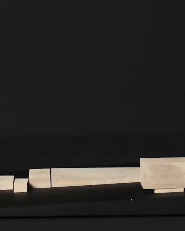 A physical model is not only a smaller version of the building. It is a vessel for its potential. It holds the whole in miniature, therefore it can carry something like the building&rsquo;s heart before anything is built. You can turn it, lift it, an