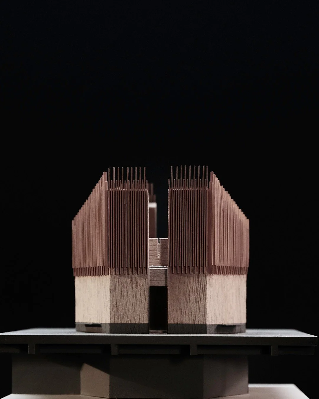 Model Shots: First glimpse of the library at the centre of Nexus House. A room and a shared place for study. Here family life and scientific work meet, anchored in the centre of a courtyard. 

A wall to wall collection of 10,000 books inside.

1. Ele