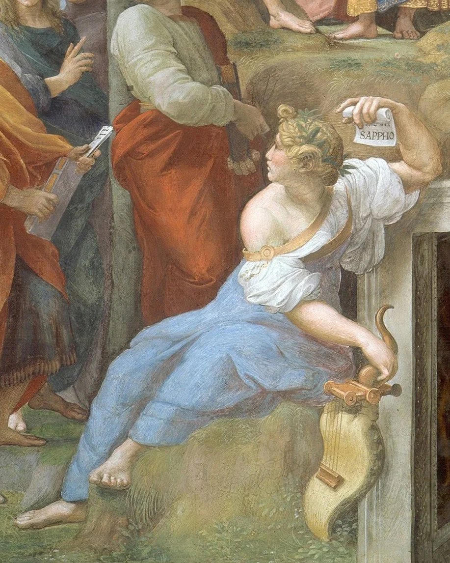 Cropped_image_of_Sappho_from_Raphael's_Parnassus_       More details Detail of Sappho from Raphael's Parnassus (1510-11), shown alongside other poets. In her left hand, she holds a scroll with her name written on it.jpg