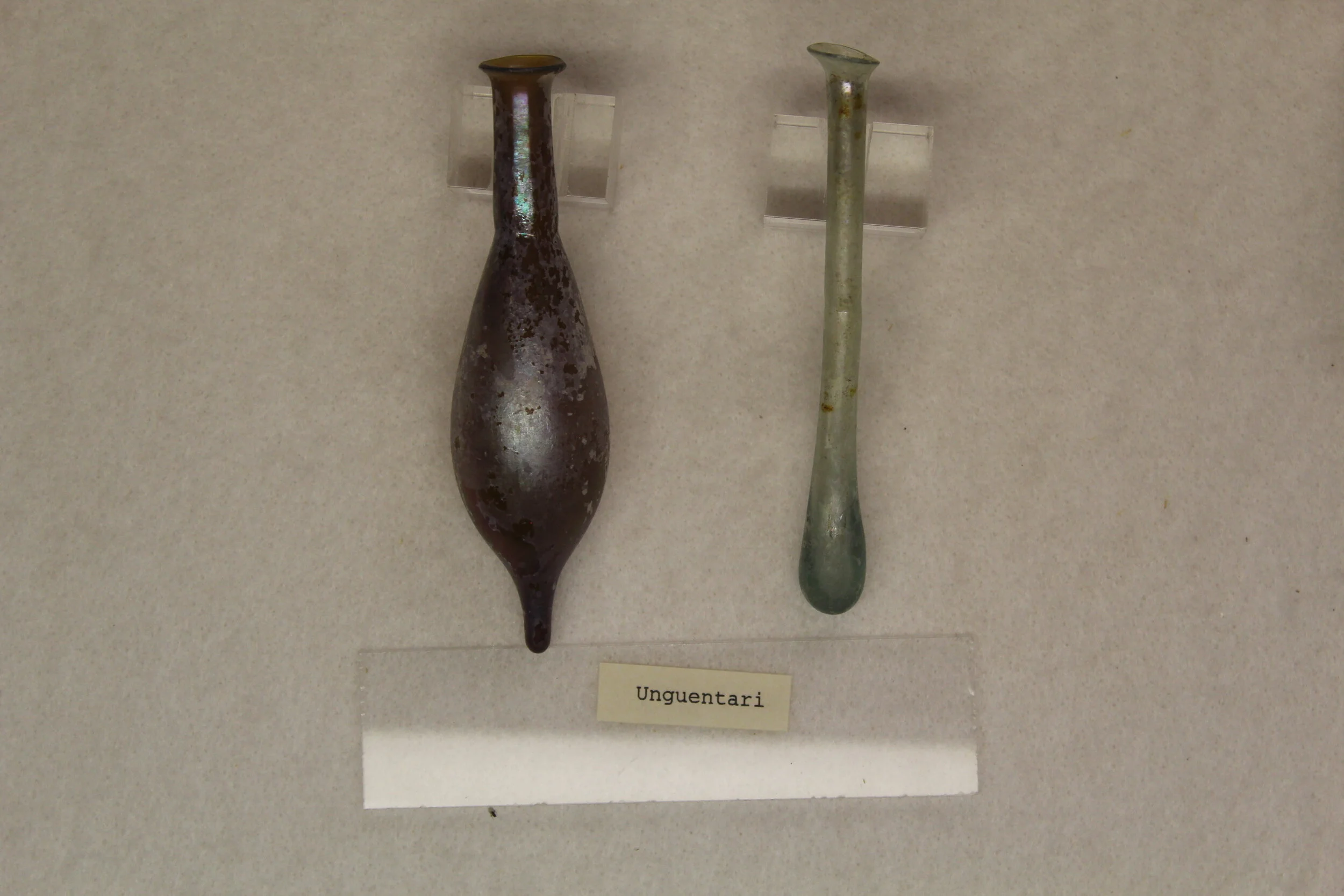 Roman perfume bottles (unguentari) on display at Villa Boscoreale.jpg
