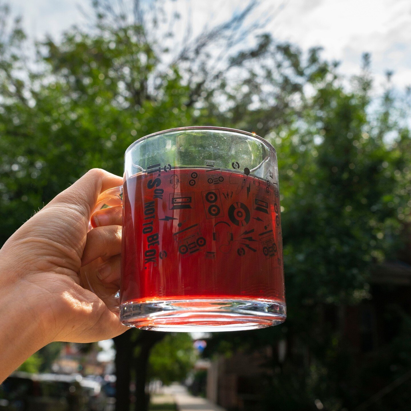 No matter the beverage, our summer mug will keep you jammin' all day long. 🎶🎧️ Shop now in the cafe or at sipofhope.com!