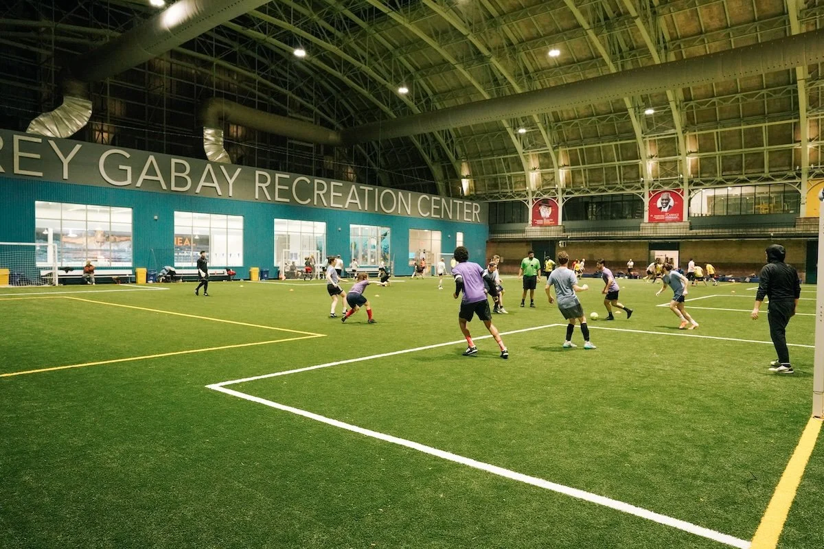 NYC Footy playing on indoor turf Bedoford Armory