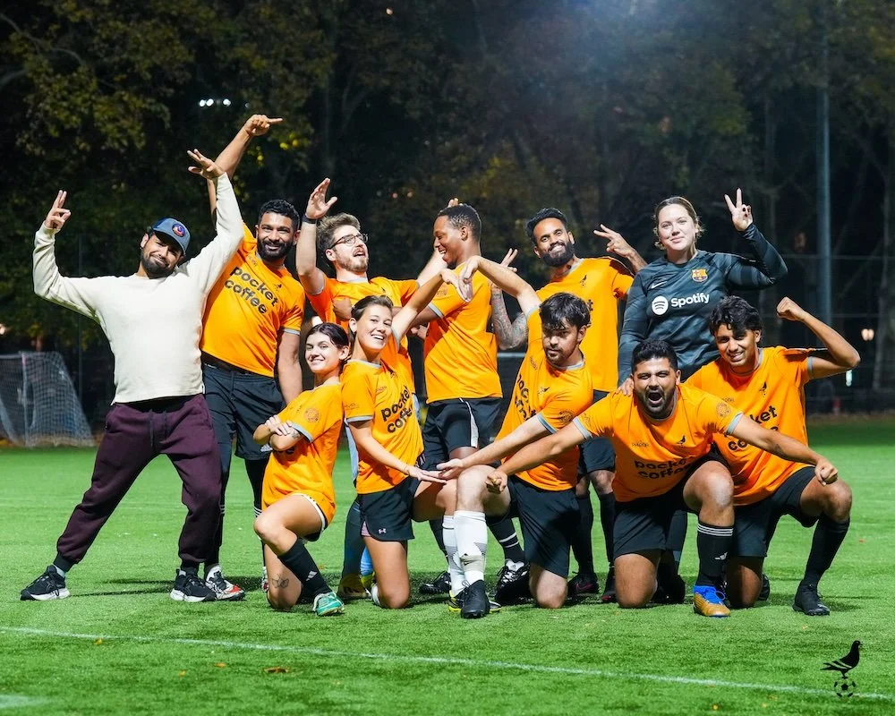 NYC Footy team wearing orange jerseys at Sternberg Park