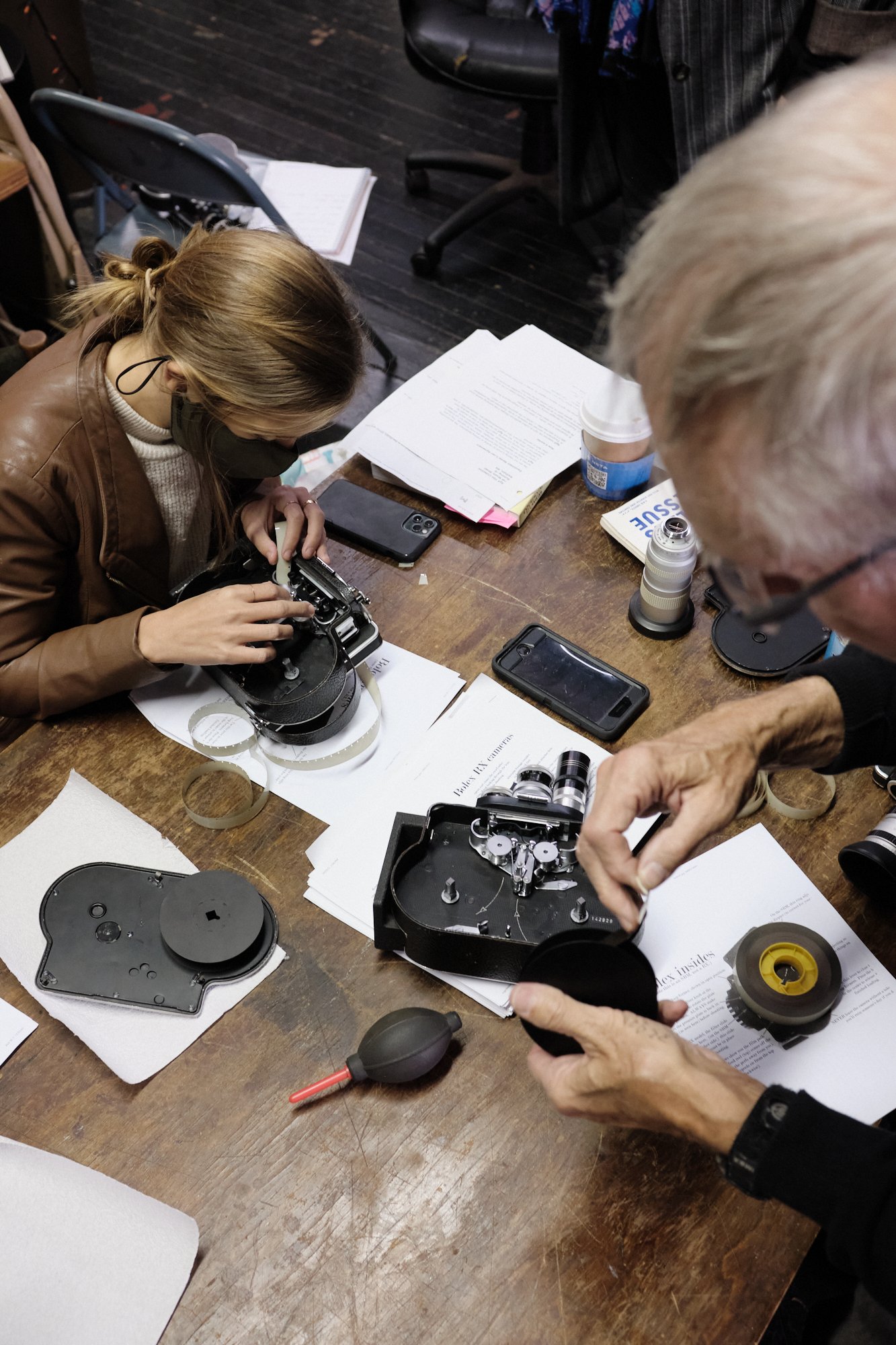  AgX members participating in a 16mm Bolex camera skillshare. 